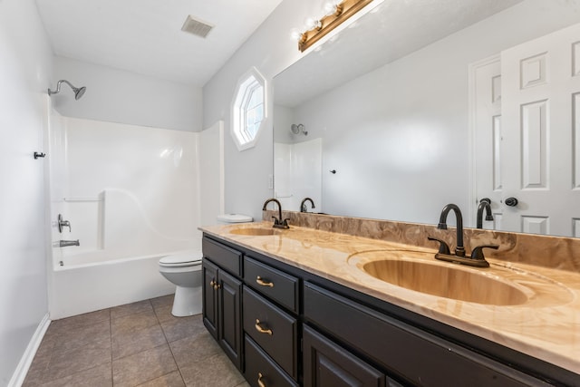 full bathroom with tile patterned flooring, vanity, toilet, and tub / shower combination