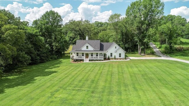 11B Double Br, Columbia, TN 38401 - back of property featuring a lawn and a porch