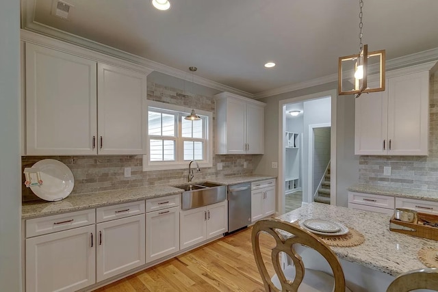 11B Double Br, Columbia, TN 38401 - kitchen featuring a sink, dishwasher, white cabinetry, tasteful backsplash, and ornamental molding