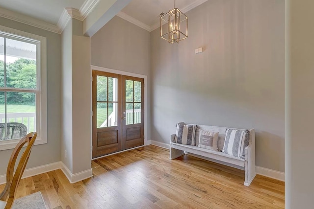 11B Double Br, Columbia, TN 38401 - entrance foyer with french doors, ornamental molding, plenty of natural light, light wood finished floors, and baseboards