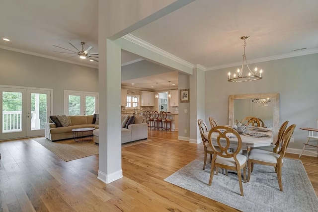 11B Double Br, Columbia, TN 38401 - dining space featuring crown molding, light wood-style floors, a ceiling fan, a chandelier, and baseboards