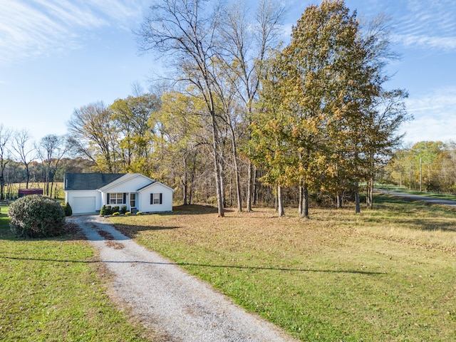 view of yard featuring a garage