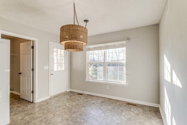 interior space featuring a textured ceiling