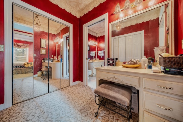 bathroom with vanity and toilet