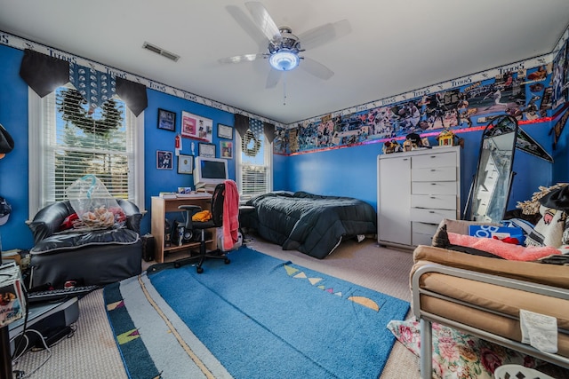 carpeted bedroom featuring ceiling fan