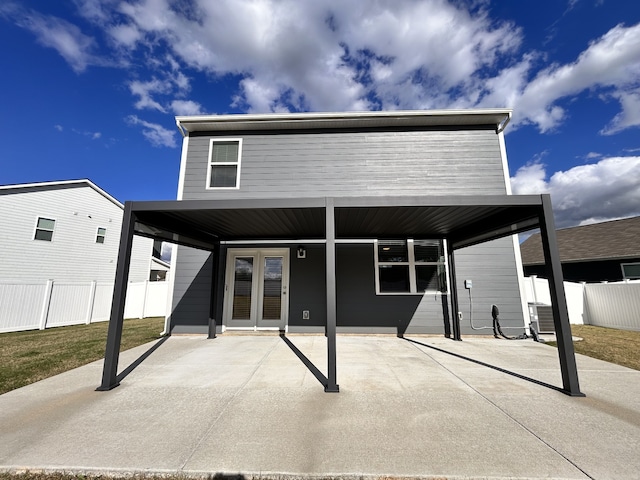 view of front of property with central AC unit