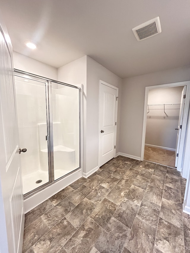 bathroom with an enclosed shower