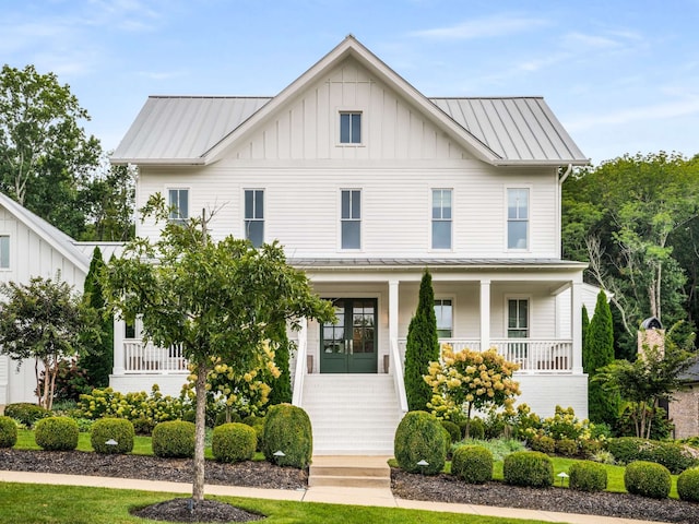 modern farmhouse featuring covered porch