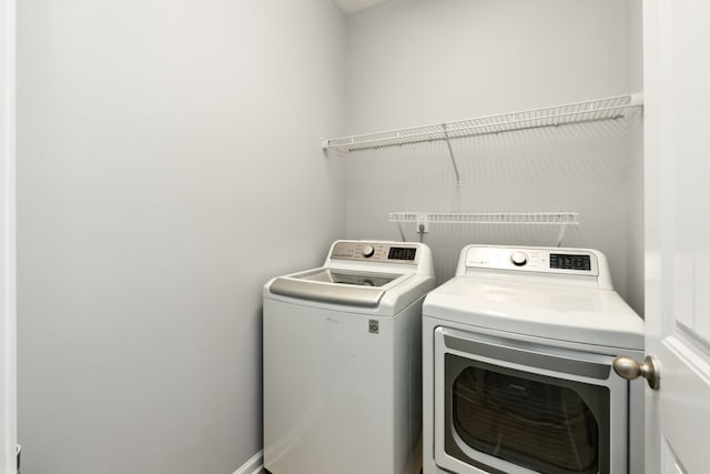 laundry room featuring independent washer and dryer