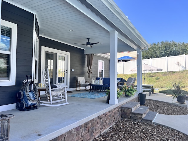 view of patio with ceiling fan