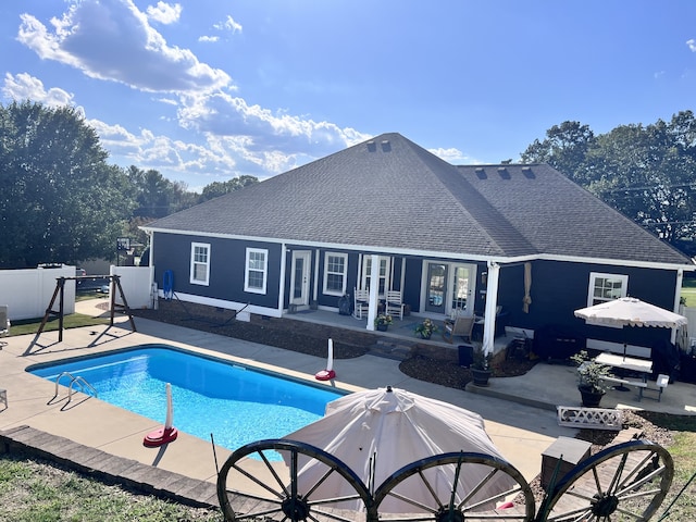 view of swimming pool featuring a patio area