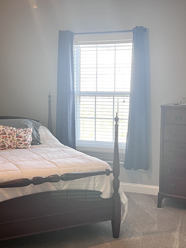 bedroom featuring carpet