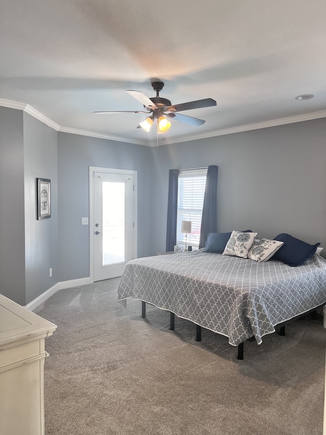 bedroom featuring ceiling fan, carpet, and ornamental molding