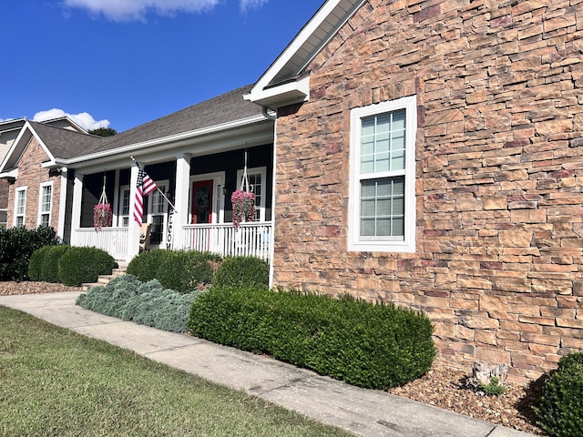 view of home's exterior featuring a porch