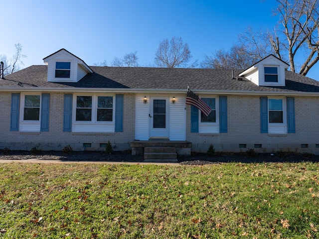 view of front of home featuring a front yard