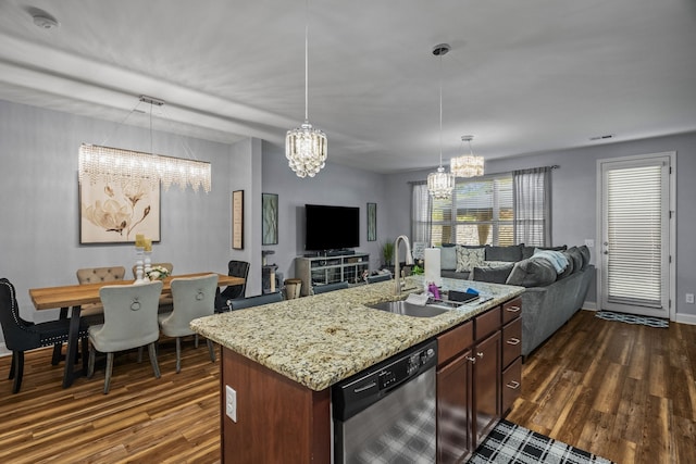 kitchen featuring dishwasher, sink, decorative light fixtures, dark hardwood / wood-style floors, and a notable chandelier