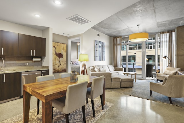 dining area featuring sink