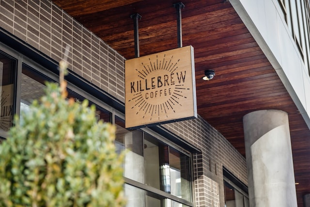 exterior details featuring wood ceiling