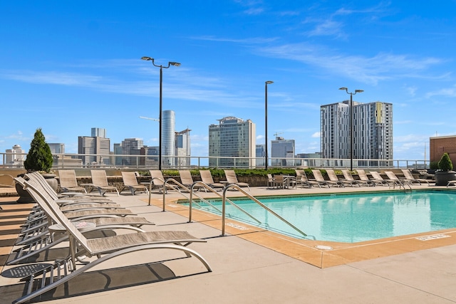 view of pool featuring a patio