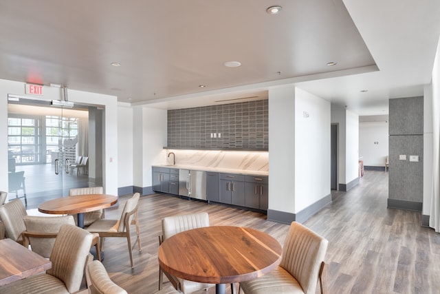 interior space featuring sink and light wood-type flooring