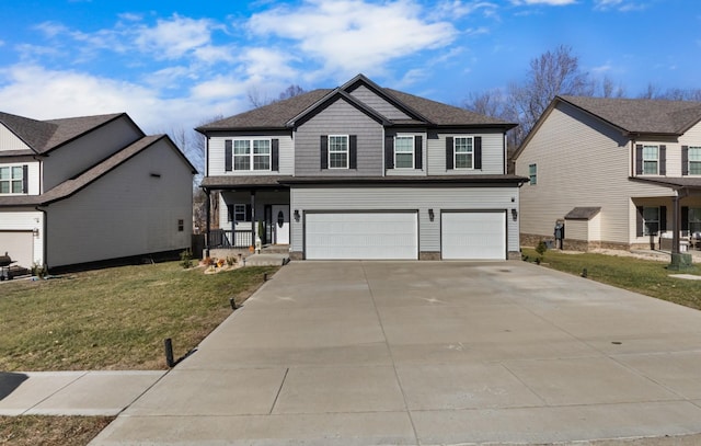 front of property with a garage, a front yard, and covered porch