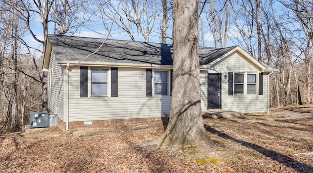 single story home featuring cooling unit