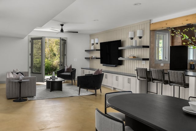 interior space featuring a wealth of natural light and ceiling fan