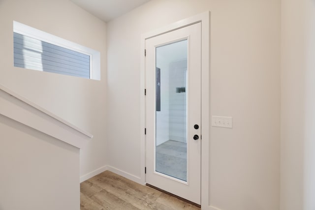 entryway with light hardwood / wood-style flooring