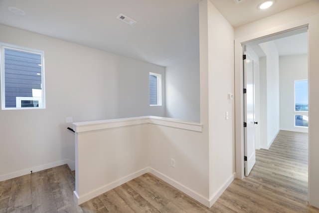 hallway featuring hardwood / wood-style floors