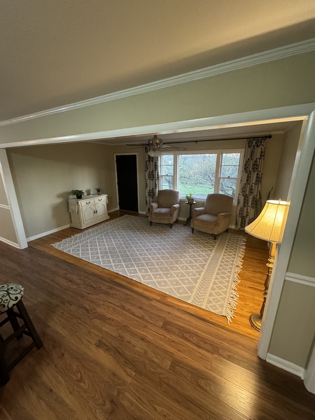 unfurnished room with crown molding and wood-type flooring