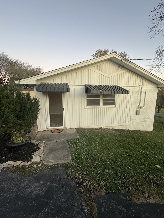 view of front of home with a front yard