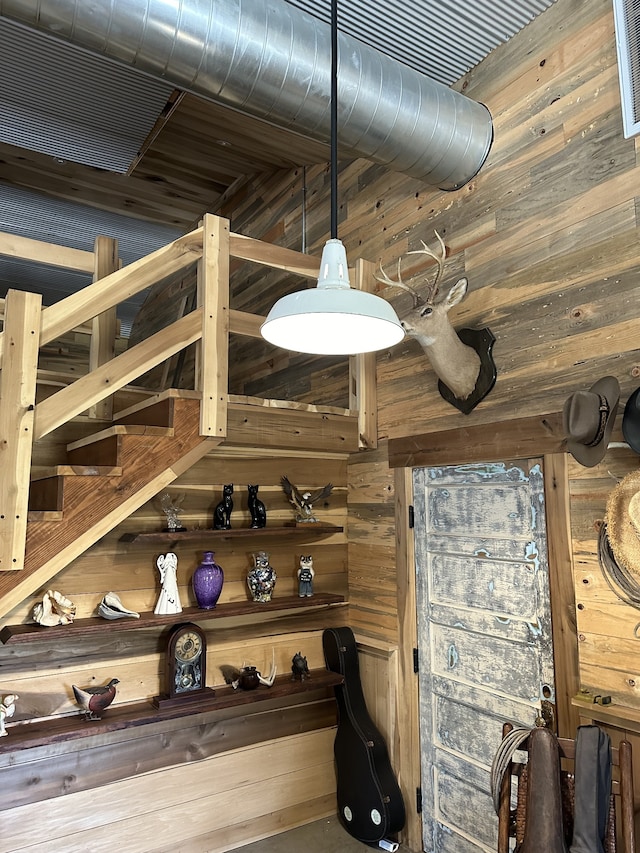 wine cellar featuring wood walls