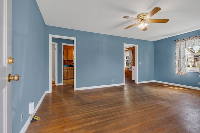 interior space featuring dark hardwood / wood-style flooring and ceiling fan