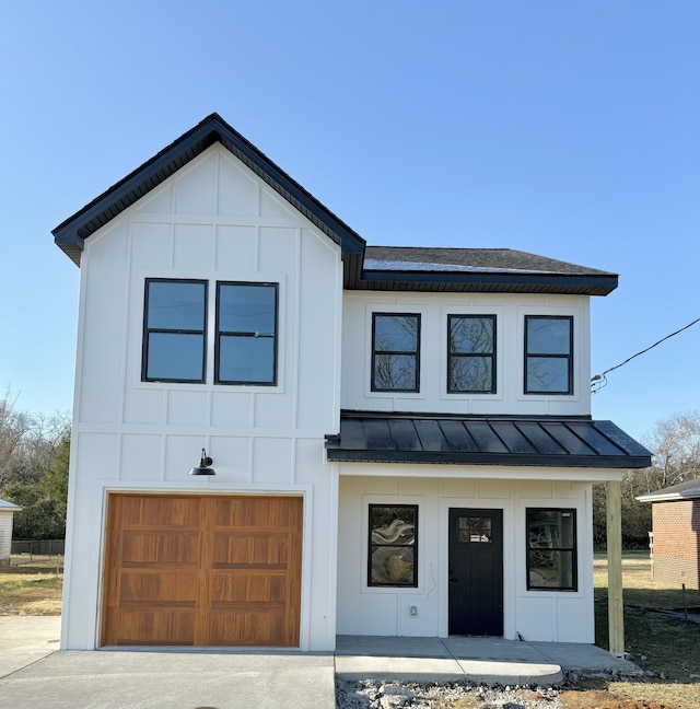 modern farmhouse style home with a garage