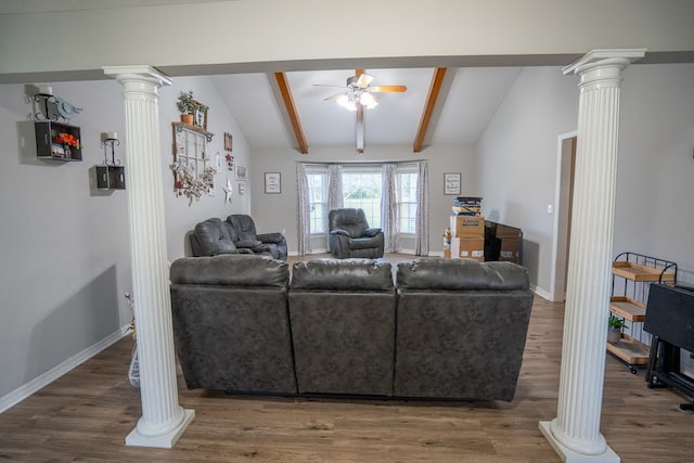 living room featuring ornate columns, ceiling fan, lofted ceiling with beams, and wood-type flooring