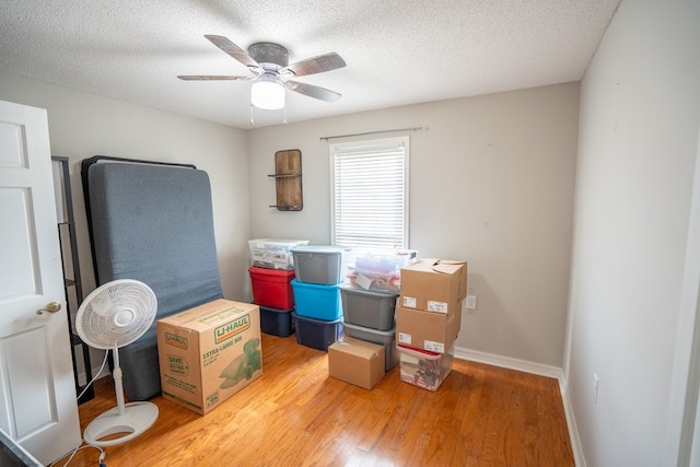 storage area featuring ceiling fan