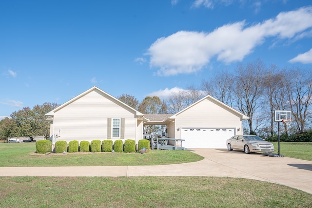 ranch-style home featuring a garage, a front lawn, and concrete driveway