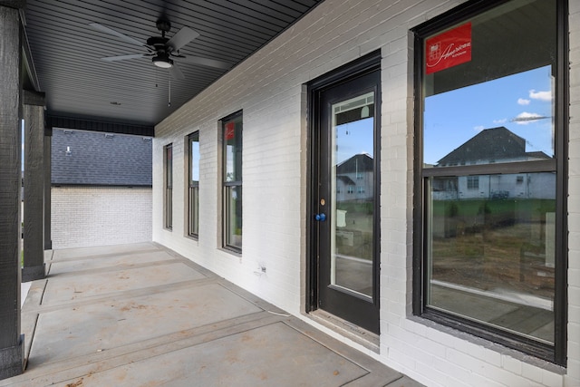 view of patio / terrace featuring ceiling fan and covered porch