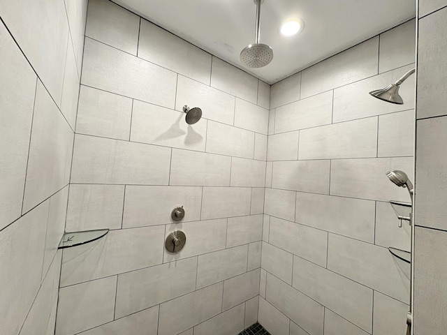 full bath with a shower stall