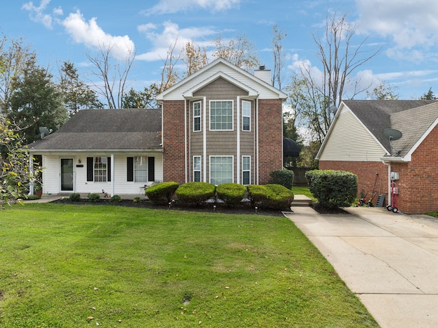 front of property featuring a front lawn