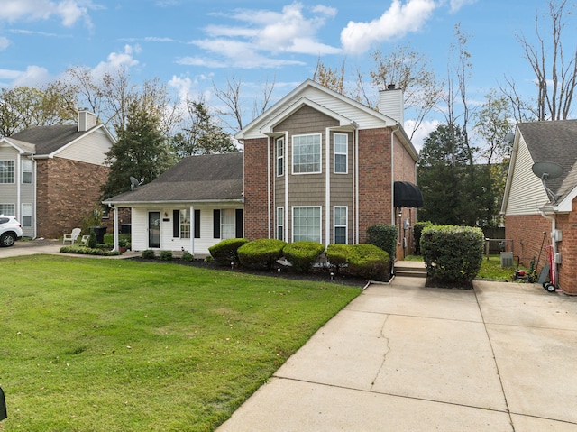 front facade featuring a front yard