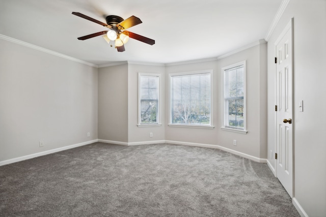 unfurnished room with carpet, ceiling fan, and crown molding