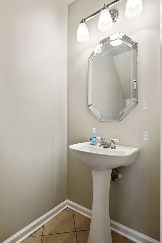 bathroom featuring tile patterned floors and sink