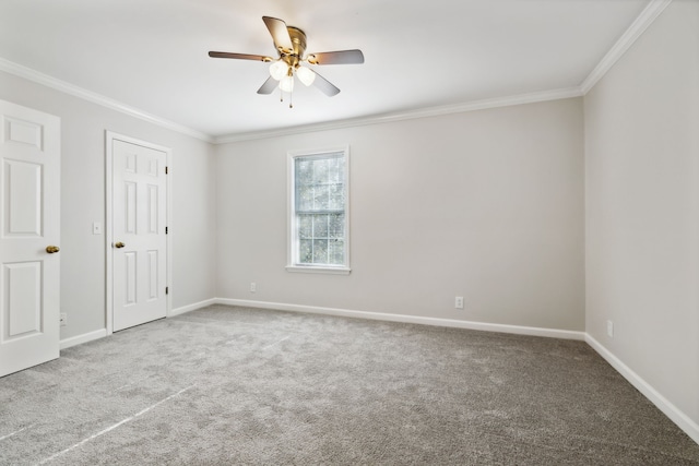 unfurnished bedroom featuring carpet flooring, ceiling fan, and ornamental molding