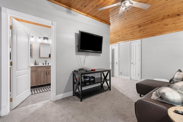 carpeted living room with ceiling fan, sink, high vaulted ceiling, and wood ceiling