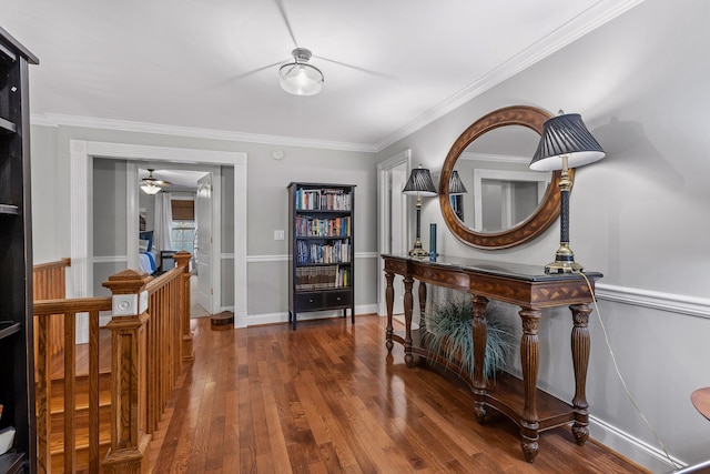 interior space with dark hardwood / wood-style flooring and ornamental molding