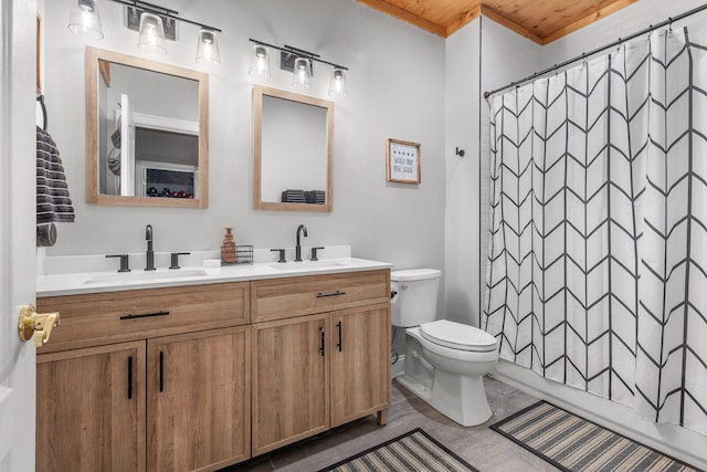 bathroom featuring tile patterned floors, wood ceiling, a shower with curtain, toilet, and vanity