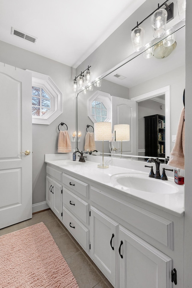 bathroom with vanity and tile patterned flooring