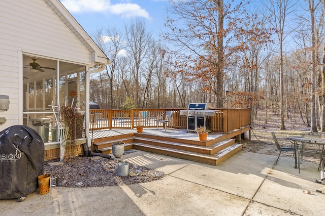 wooden terrace with ceiling fan, a sunroom, grilling area, and a patio