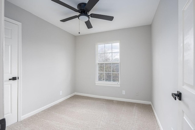 empty room with carpet and ceiling fan